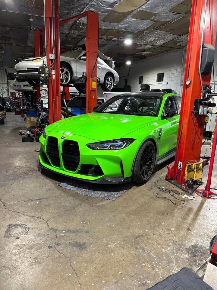 Isle of Man green G80 M3 Competition on the lift